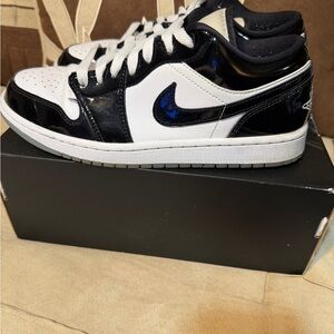Jordan Black and White Sneakers with Blue Accent